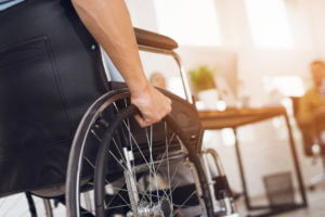 A man in a wheelchair who just purchased it from a Durable Medical Equipment provider.